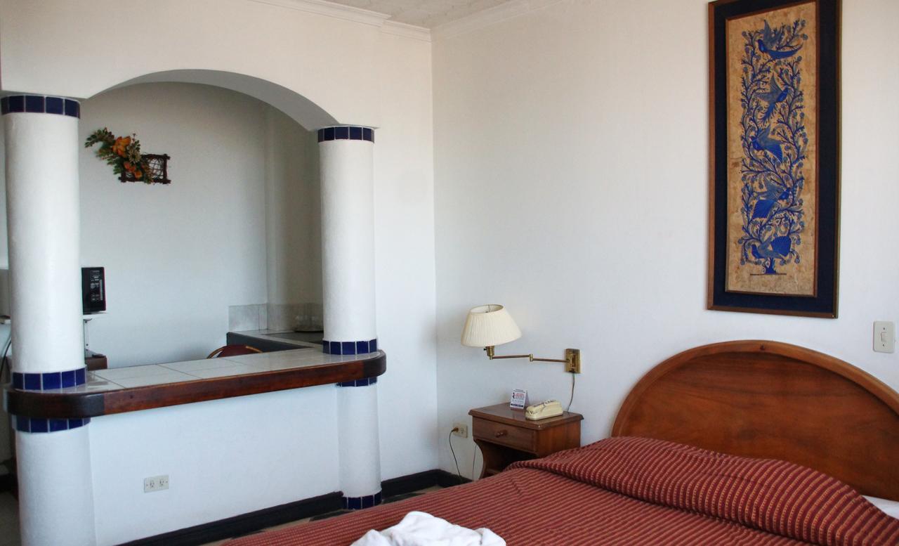 Hotel Valladolid Heredia Bagian luar foto